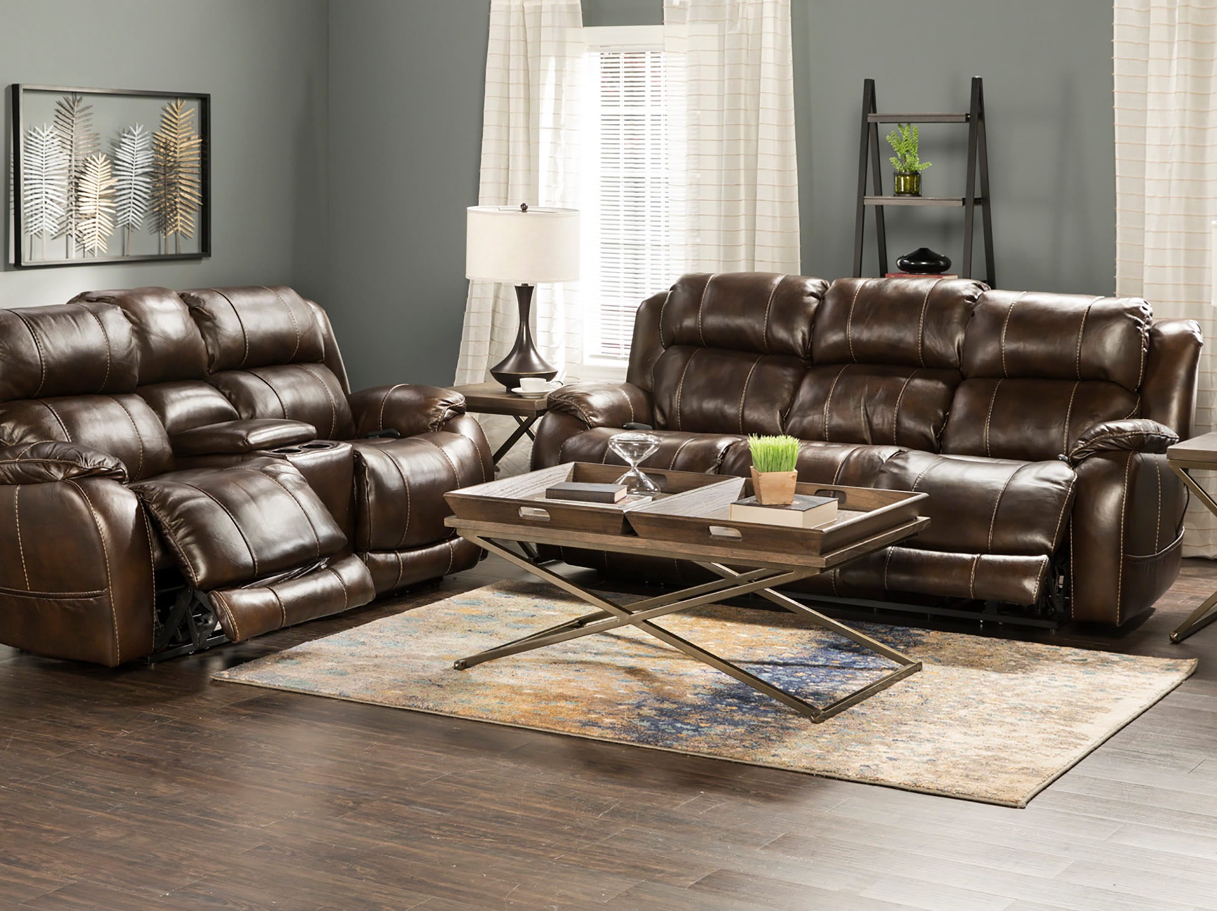 Milany leather reclining deals sofa